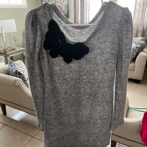 Grey sweater with black flowers brand is unknown